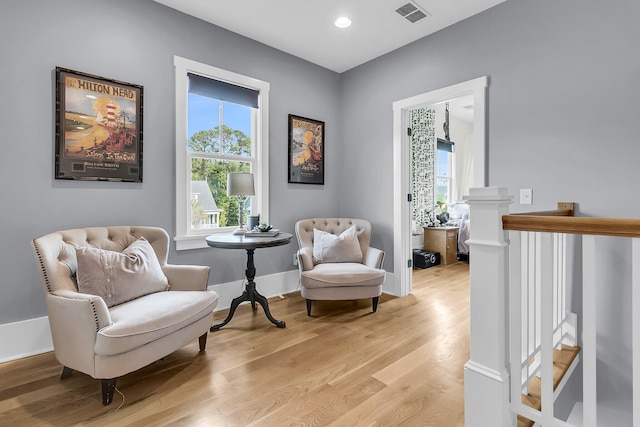 sitting room with light hardwood / wood-style floors