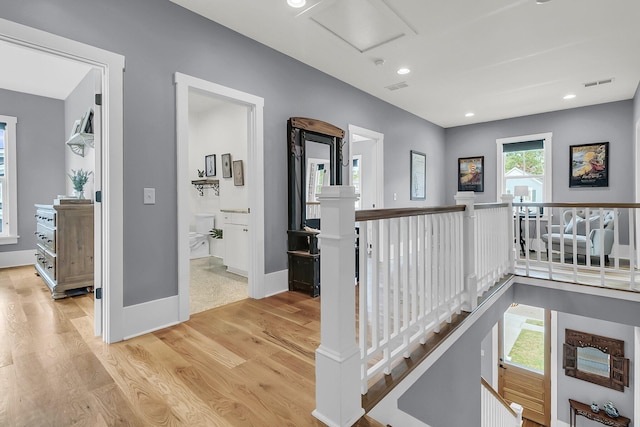 hallway featuring light wood-type flooring