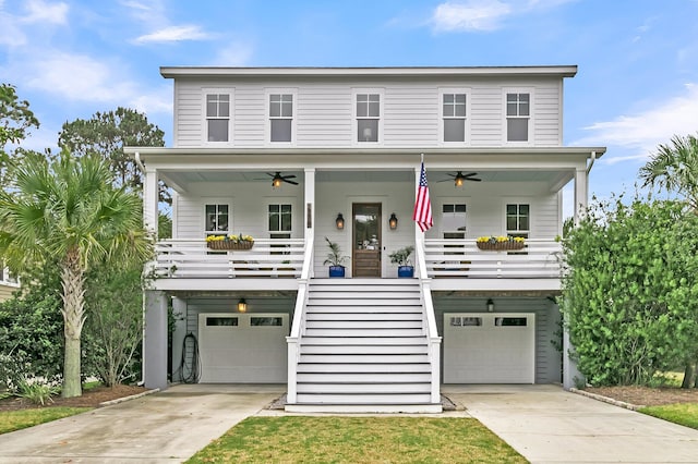 view of front of house with a porch and a garage