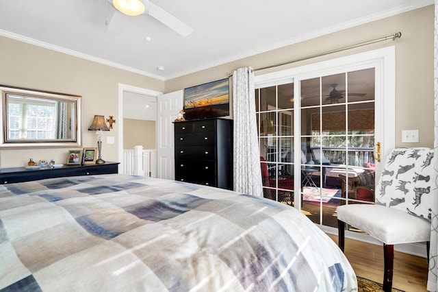 bedroom with a ceiling fan, crown molding, and wood finished floors