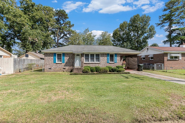 ranch-style house with a front yard and cooling unit