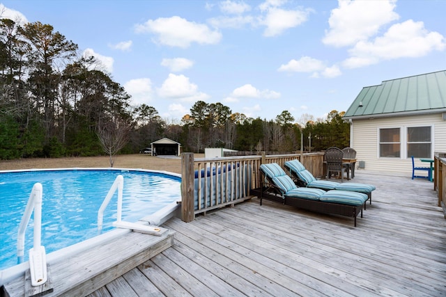 pool with a wooden deck