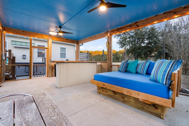 view of patio / terrace featuring ceiling fan and an outdoor living space