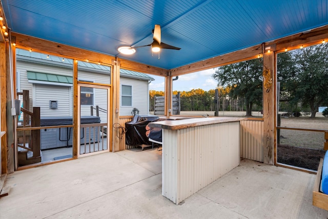 view of patio / terrace with grilling area and a ceiling fan