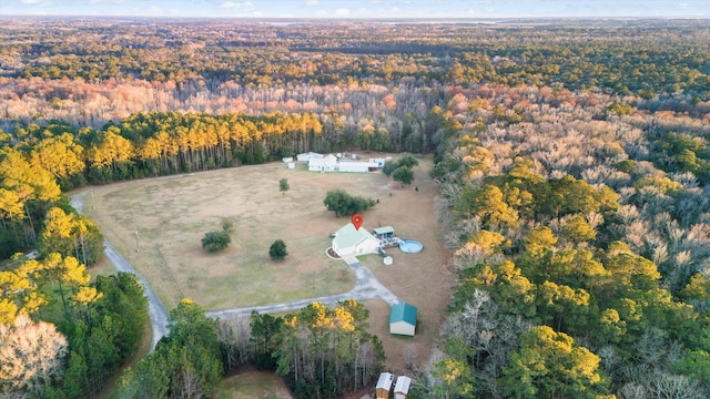 aerial view with a wooded view