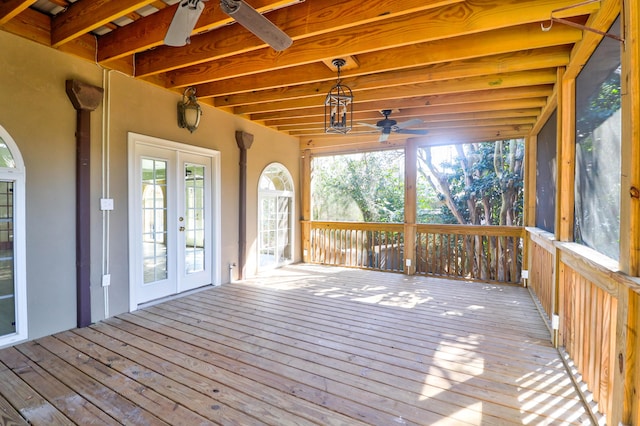 deck featuring ceiling fan and french doors