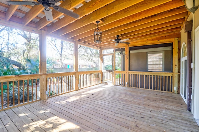 wooden deck featuring ceiling fan