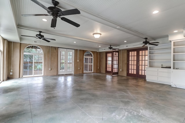 unfurnished living room with recessed lighting, french doors, visible vents, and beamed ceiling