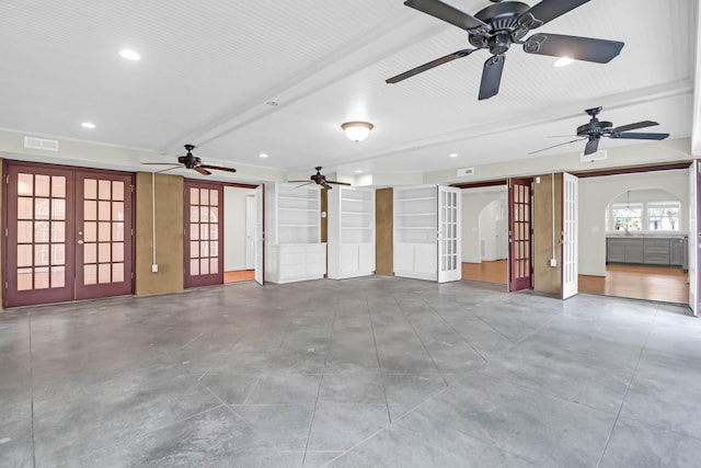 garage with recessed lighting, visible vents, and french doors