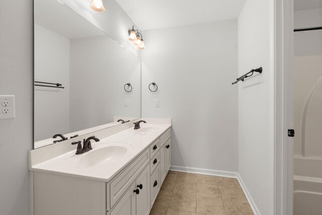 bathroom featuring vanity and tile patterned flooring