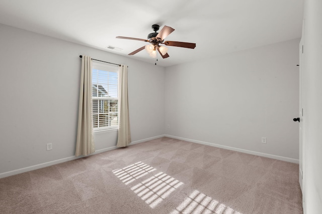 carpeted empty room with ceiling fan