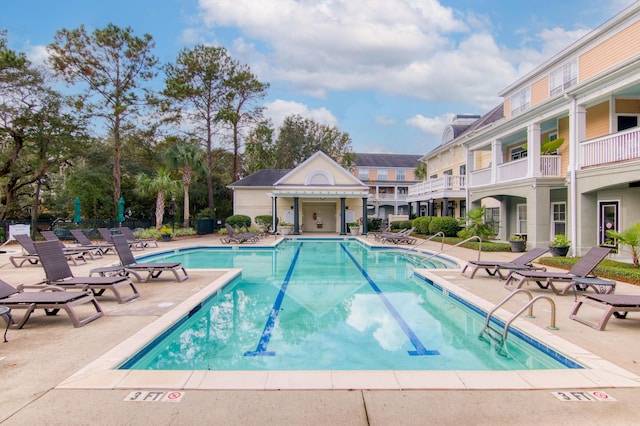 pool with a patio area