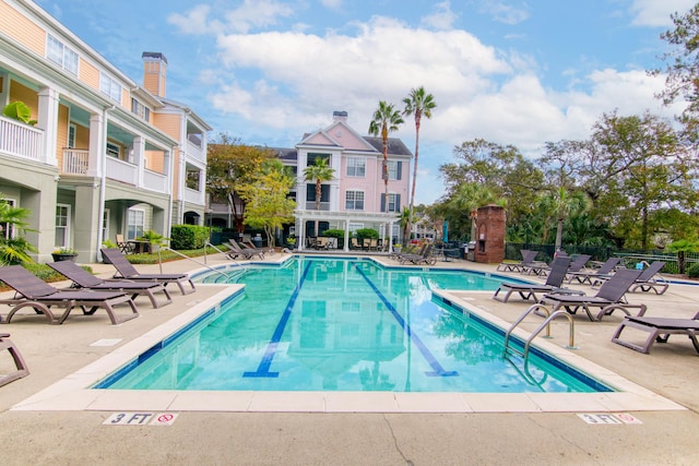 community pool with a patio