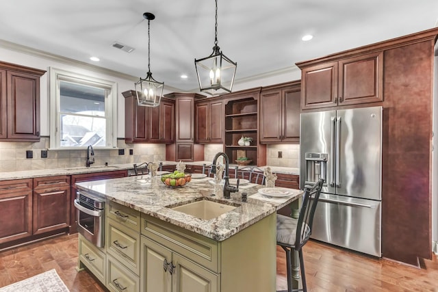 kitchen with visible vents, open shelves, stainless steel appliances, and a sink