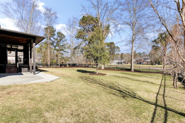 view of yard with a patio area and fence