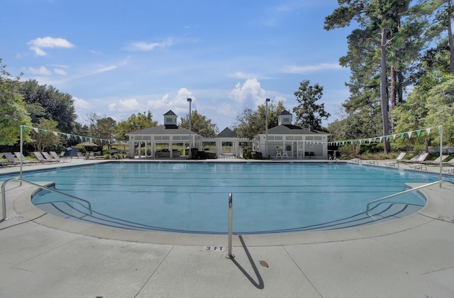 pool featuring a patio area