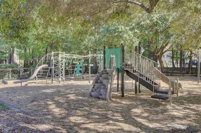 communal playground featuring fence