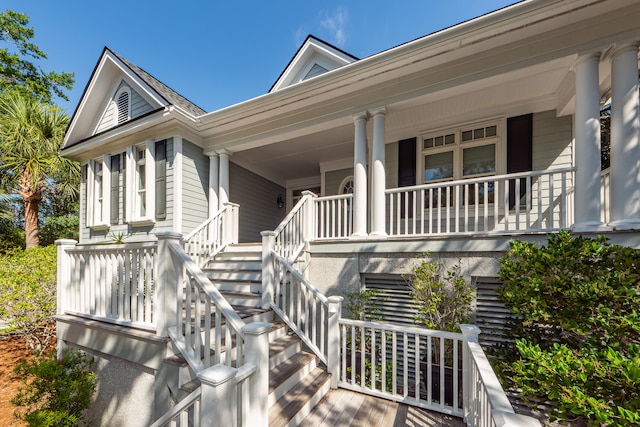 property entrance featuring a porch