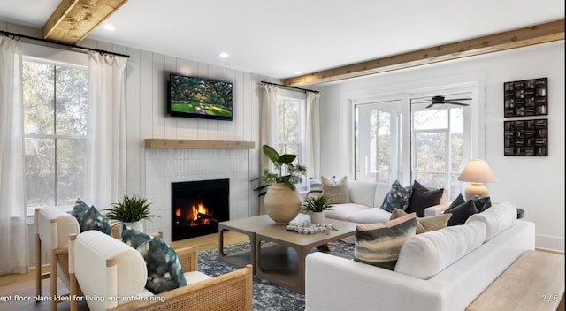148 Falaise St, Charleston, SC 29492 - living area featuring wood finished floors, healthy amount of natural light, beam ceiling, a fireplace, and recessed lighting