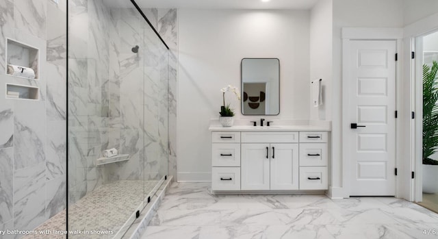 148 Falaise St, Charleston, SC 29492 - bathroom with a marble finish shower, marble look tile flooring, vanity, and baseboards