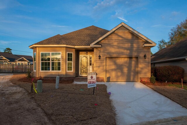 view of front of property featuring a garage