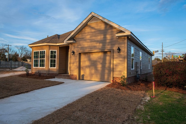 view of front of home with a garage