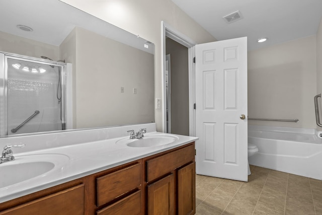 full bathroom with vanity, tile patterned floors, shower with separate bathtub, and toilet