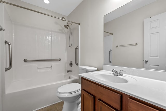 full bathroom featuring shower / tub combination, vanity, tile patterned floors, and toilet