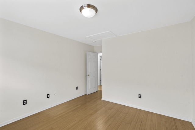 unfurnished room featuring light hardwood / wood-style flooring