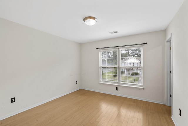 empty room featuring light hardwood / wood-style floors