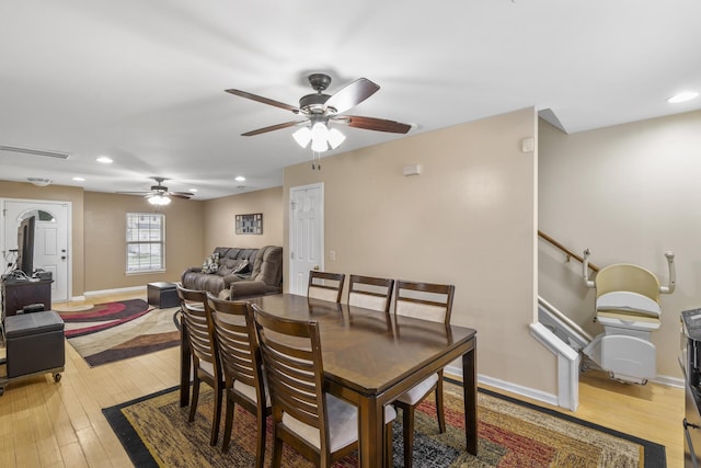 dining room featuring ceiling fan and light hardwood / wood-style floors