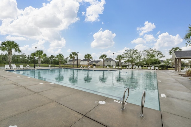 view of pool featuring a patio area