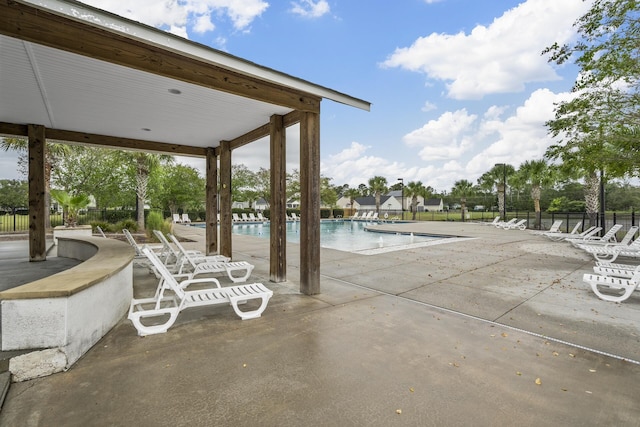 view of pool featuring a patio area