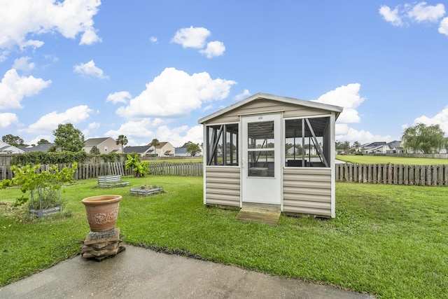 view of outdoor structure featuring a yard