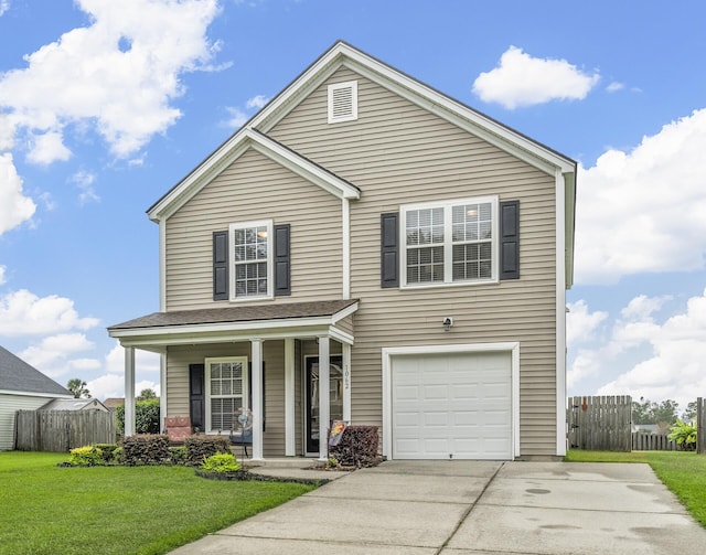 view of front property featuring a garage, a porch, and a front yard