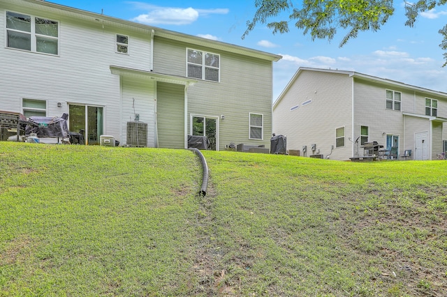 9101 Parlor Dr, Ladson, SC 29456 - rear view of property with a lawn