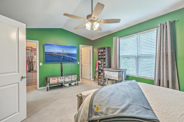 9101 Parlor Dr, Ladson, SC 29456 - carpeted bedroom featuring lofted ceiling, a spacious closet, a ceiling fan, and a closet