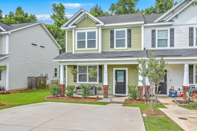 9101 Parlor Dr, Ladson, SC 29456 - view of front of home featuring covered porch and board and batten siding