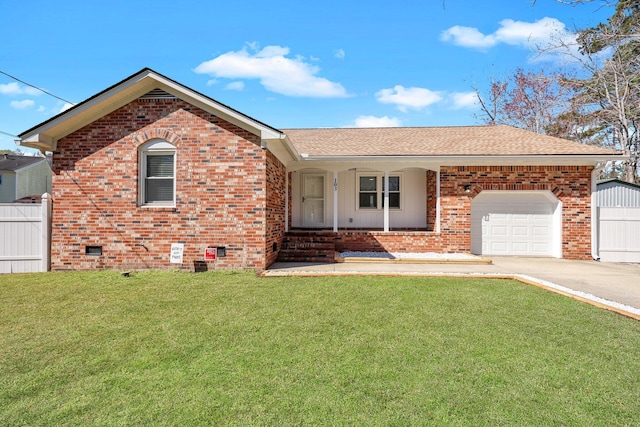 ranch-style home with crawl space, a garage, a front lawn, and brick siding