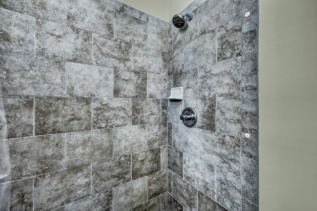 details with a tile shower