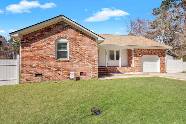 ranch-style house featuring brick siding, concrete driveway, an attached garage, a front yard, and crawl space