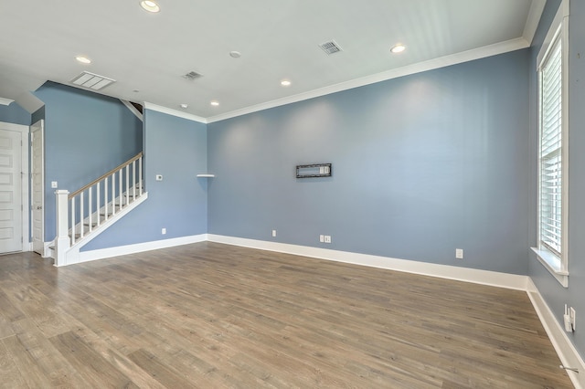 3125 Sturbridge Rd, Mount Pleasant, SC 29466 - unfurnished room featuring crown molding, stairs, recessed lighting, wood finished floors, and baseboards