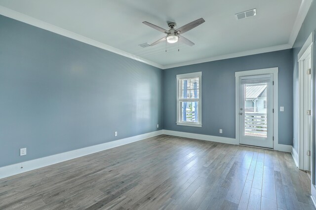 3125 Sturbridge Rd, Mount Pleasant, SC 29466 - spare room with crown molding, ceiling fan, baseboards, and wood finished floors