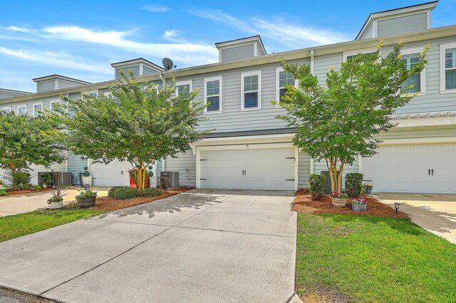 3125 Sturbridge Rd, Mount Pleasant, SC 29466 - view of property featuring central air condition unit, a garage, and concrete driveway