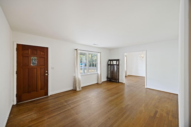 entrance foyer featuring hardwood / wood-style floors