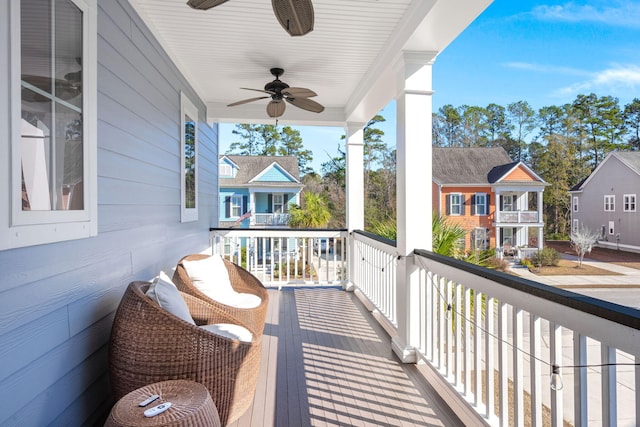 balcony featuring ceiling fan