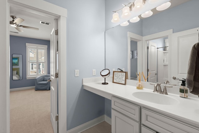 bathroom featuring vanity and ceiling fan