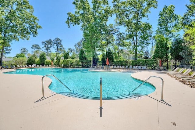 view of pool featuring a patio