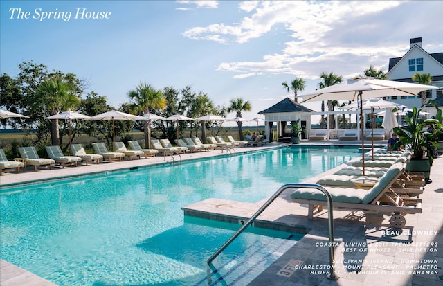 view of swimming pool featuring a patio