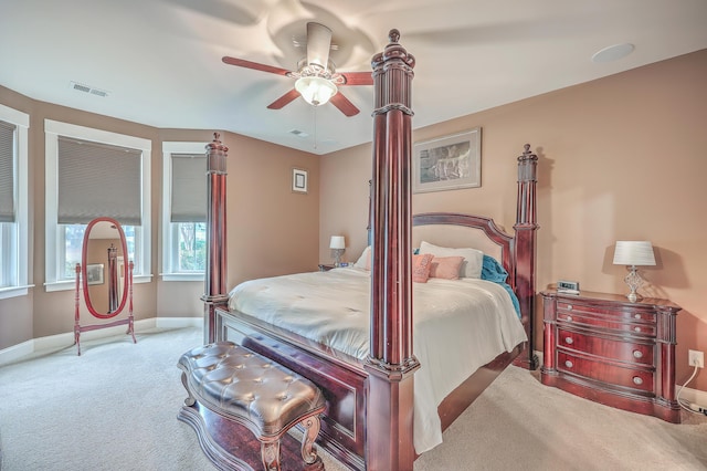 carpeted bedroom with ceiling fan